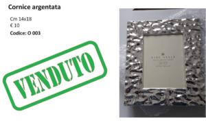 Cornice argento sbalzata